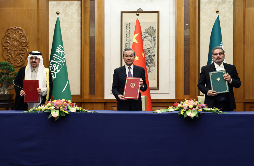  Wang Yi, a member of the Political Bureau of the Communist Party of China (CPC) Central Committee and director of the Office of the Central Foreign Affairs Commission attends a meeting with Secretary of Iran's Supreme National Security Council Ali Shamkhani and Minister of State and national securi (photo credit: CHINA DAILY VIA REUTERS)