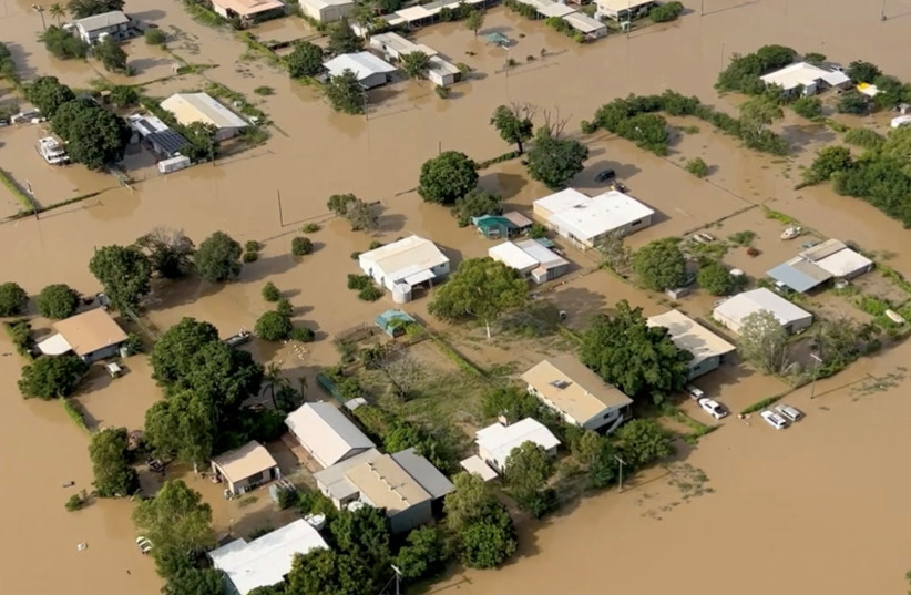  Footage from a helicopter of flooding due to heavy rain in Burketown, Queensland, Australia March 11, 2023 (credit: AARON FINN, NAUTILUS AVIATION VIA REUTERS)