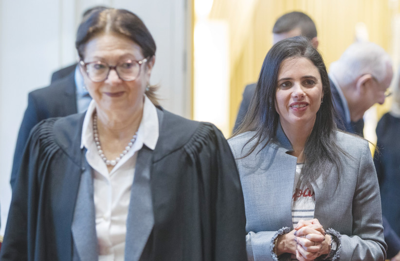  SUPREME COURT President Esther Hayut (left) and the writer, then serving as justice minister, attend the swearing-in of new judges at the President’s Residence in Jerusalem, in 2019. (photo credit: NOAM REVKIN FENTON/FLASH90)
