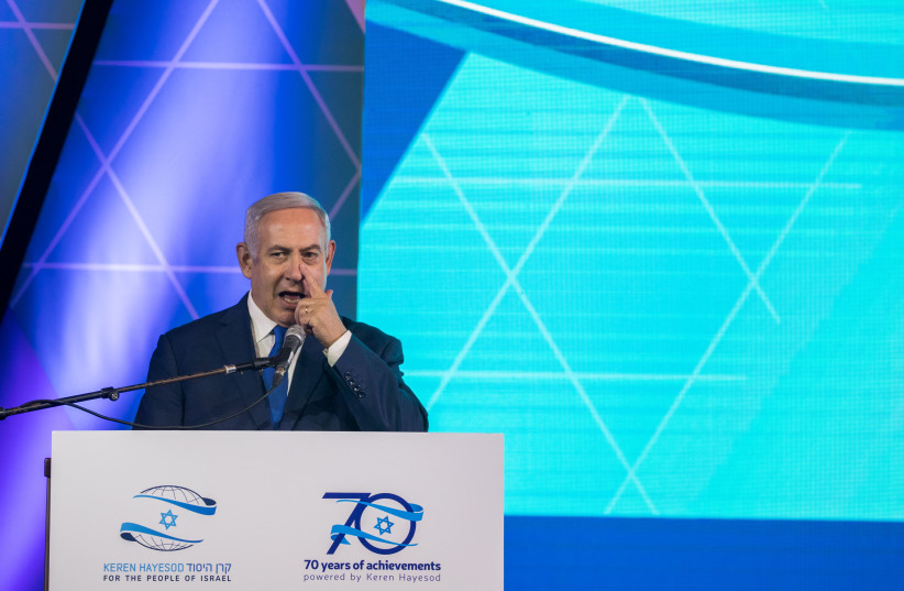  Prime Minister Benjamin Netanyahu speaks at Keren Hayesod Annual World Conference at the International Convention Center in Jerusalem on April 16, 2018 (photo credit: YONATAN SINDEL/FLASH90)