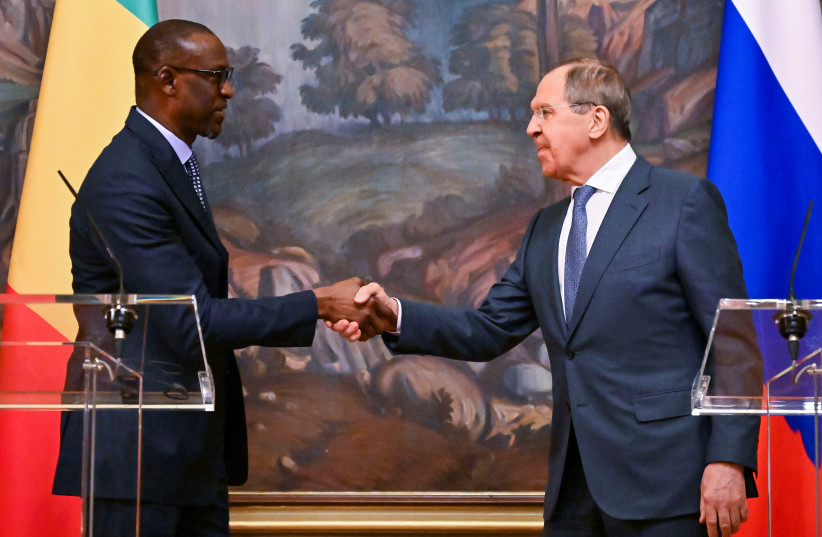  Russian Foreign Minister Sergei Lavrov shakes hands with Mali's Minister of Foreign Affairs and International Cooperation Abdoulaye Diop during a news conference, in Moscow, Russia May 20, 2022.  (credit: YURI KADOBNOV/POOL VIA REUTERS)