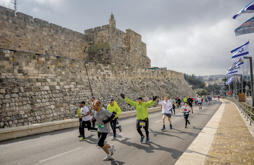  THE OLD City makes for an uncommon marathon backdrop; pictured 2022. (credit: YONATAN SINDEL/FLASH90)