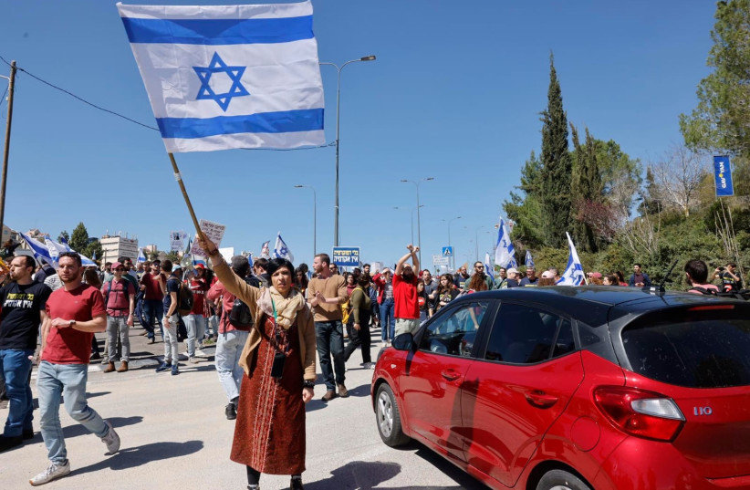  Israelis protest against the current Israeli government and their planned reforms, in Tel Aviv, on March 16, 2023 (photo credit: MARC ISRAEL SELLEM/THE JERUSALEM POST)