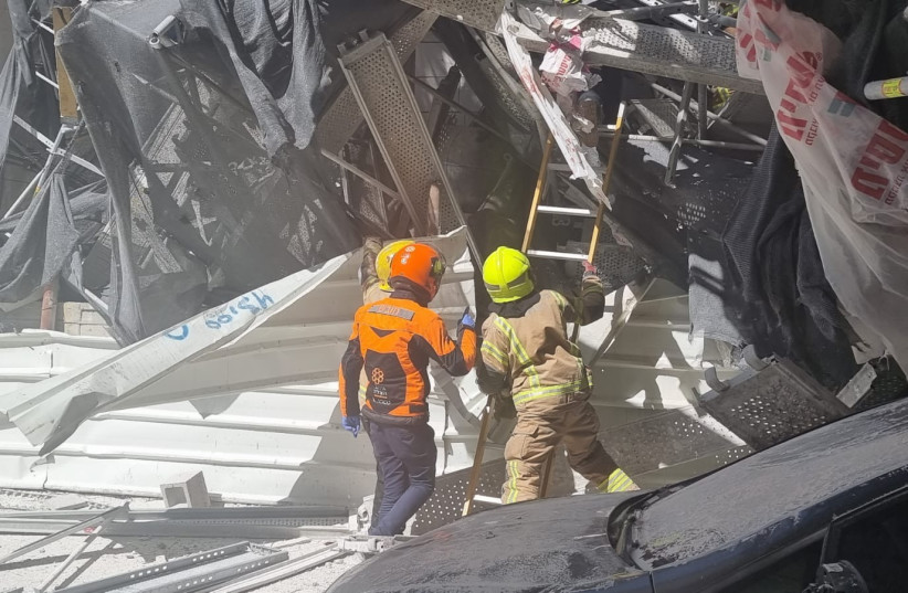 First responders at the scene of the collapsed scaffolding in Ramat Gan, March 16 2023. (photo credit: UNITED HATZALAH‏)