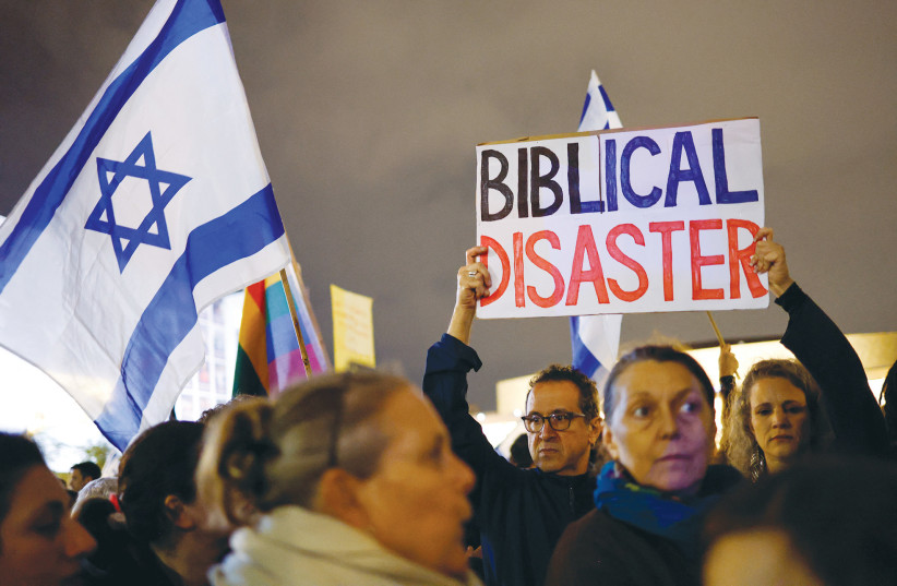  PROTESTERS ATTEND a demonstration in Tel Aviv in January against Prime Minister Benjamin Netanyahu’s government.  (photo credit: AMIR COHEN/REUTERS)