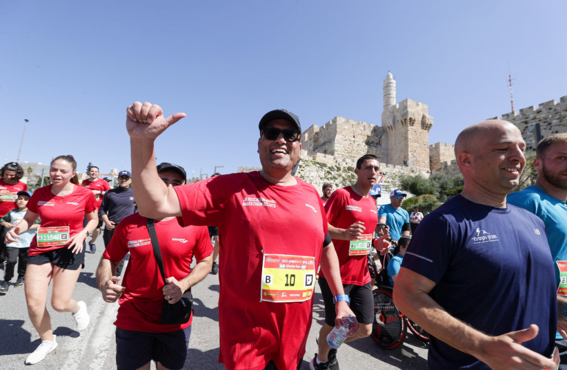  Jerusalem Mayor Moshe Lion is seen running in the Jerusalem Winner Marathon, on March 17, 2023. (credit: Sportphotography)