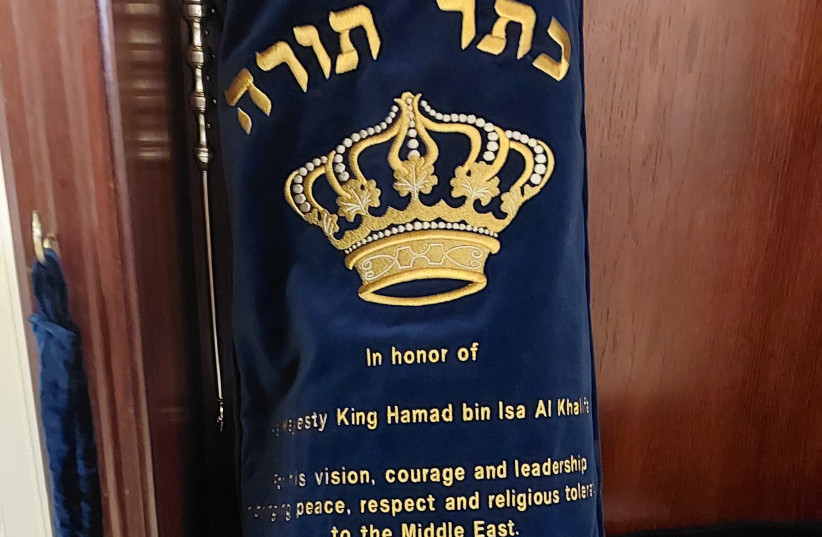  Torah scroll dedicated by Jared Kusner in honor of Bahrain's king in Manama's synagogue (credit: HERB KEINON)