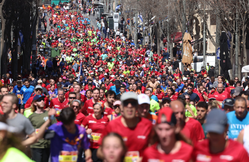 Jerusalem Marathon participants are seen running on March 17, 2023 (credit:  SPORTPHOTOGRAPHY)