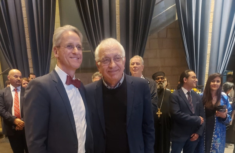  DR. DAVID Rutstein, secretary-general of the Baha’i International Community (left), with Prof. Meir Ben Asher.  (credit: STEVE LINDE)