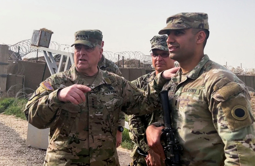 US Joint Chiefs Chair Army General Mark Milley speaks with US forces in Syria during an unannounced visit at a US military base in northeast Syria, March 4, 2023. (credit: REUTERS/PHIL STEWART/FILE PHOTO)