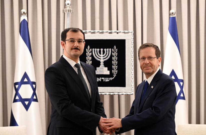 Azerbaijan's ambassador to Israel, Mukhtar Mammadov, presents his credentials to President Isaac Herzog on March 26, 2023. (credit: CHAIM TZACH/GPO)