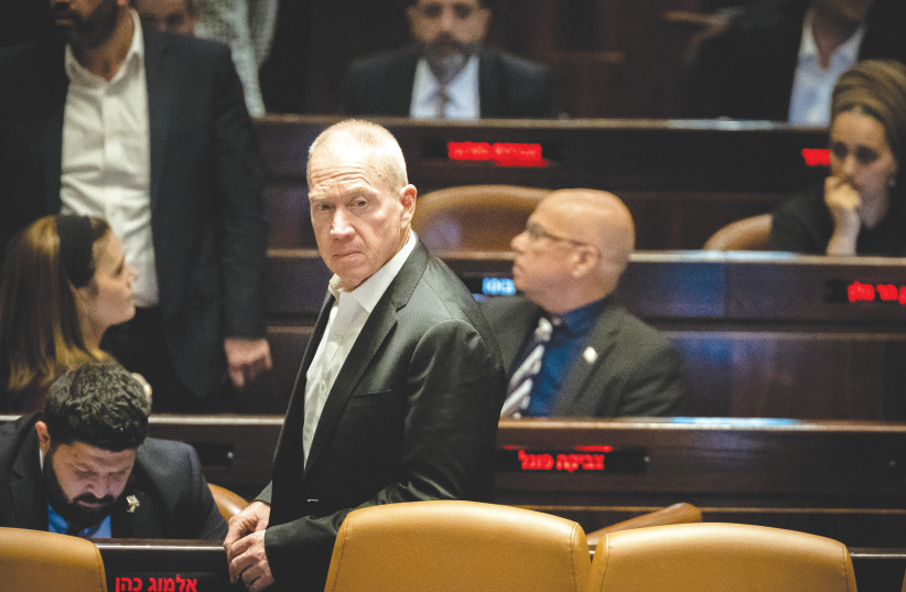  DEFENSE MINISTER Yoav Gallant looks toward the government table in the Knesset plenum, last Wednesday. (credit: YONATAN SINDEL/FLASH90)
