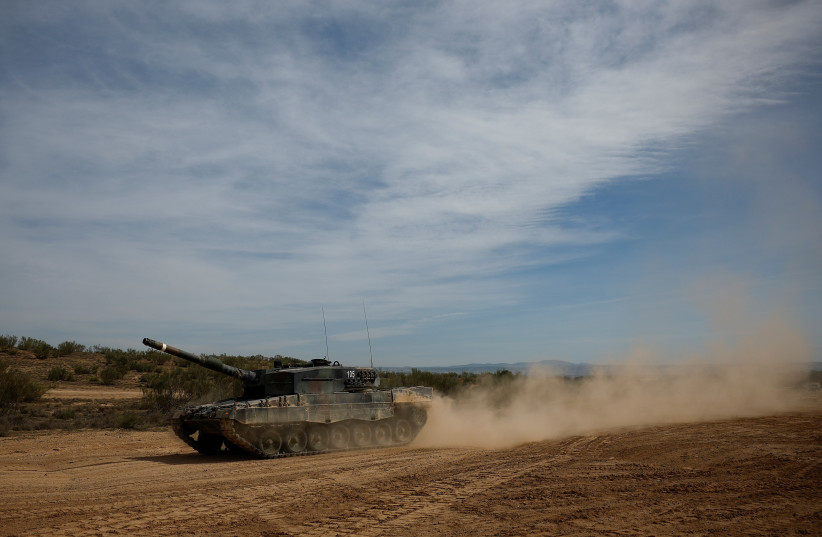  Members of the Spanish Armed Forces give training to Ukrainian military personnel in the operation and maintenance of Leopard battle tanks, at San Gregorio Training Center in Zaragoza, Spain, March 13, 2023. (credit: REUTERS/JUAN MEDINA)
