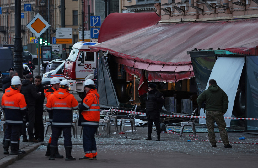 Investigators and members of emergency services work at the site of an explosion in a cafe in Saint Petersburg, Russia April 2, 2023 (credit: REUTERS)