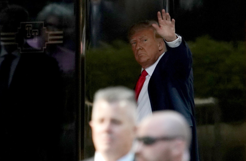  Former U.S. President Donald Trump arrives at Trump Tower, after his indictment by a Manhattan grand jury following a probe into hush money paid to porn star Stormy Daniels, in New York City, U.S April 3, 2023. (credit: REUTERS/David Dee Delgado)