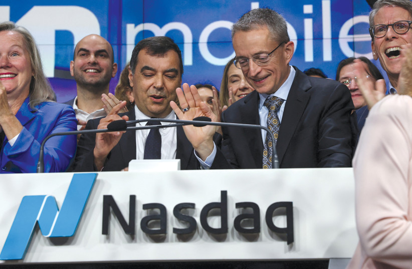  Amnon Shashua (left) and Intel CEO Pat Gelsinger (right) ring the opening bell for Mobileye Global at the Nasdaq Market Site in Times Square in New York City on October 26, 2022.  (credit: Shannon Stapleton/Reuters)