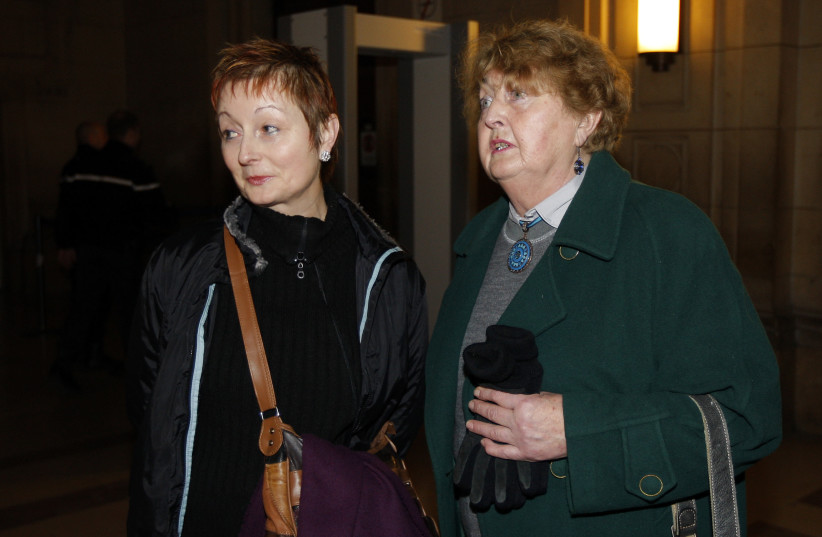  Magdeleine Sauvage (R), wife of Paul Sauvage, one of the victim in the bomb attack, arrives at the courtroom for the trial of Khalid Sheikh Mohammed, Christian Ganczarski and Walid Nouar in Paris January 5, 2009. A French court will begin the trial of Mohammed and Ganczarski, suspected lieutenants  (credit: REUTERS/BENOIT TESSIER)