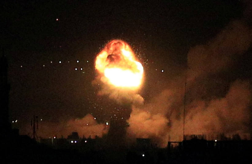  Smoke and flames rise during Israeli airstrikes in Gaza, April 6, 2023. (credit: Bashar Talib/Reuters)