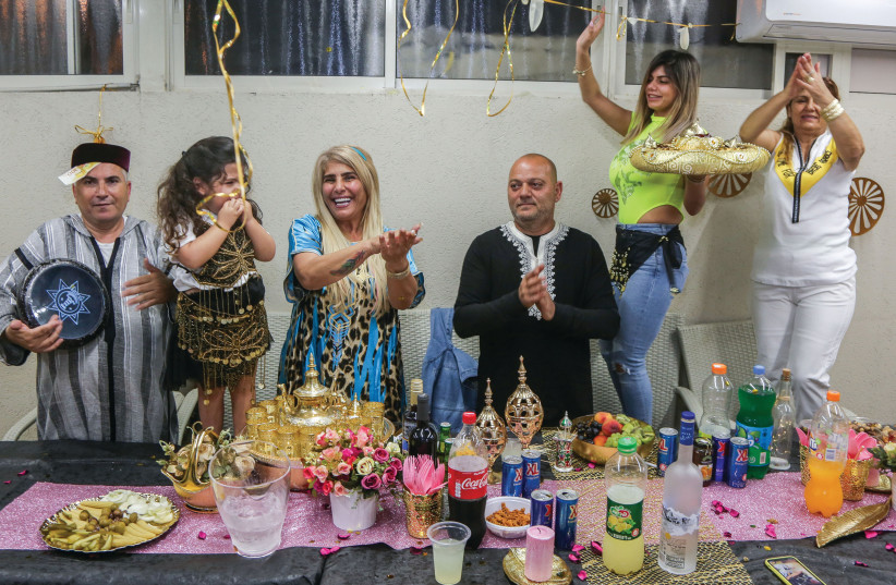  A FAMILY celebrates Mimouna in Ashkelon. (credit: EDI ISRAEL/FLASH90)