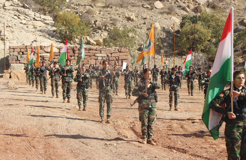  MILITANTS OF the Kurdistan Freedom Party conduct a drill in the Kurdish region of Iraq. (credit: JONATHAN SPYER)