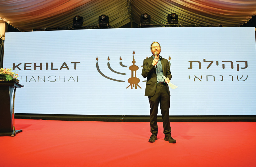  JESSE MARKS at an in-person Seder in 2019, attended by 150 people, at the Kehillat Shanghai progressive congregation. (credit: Jerome Zhang)