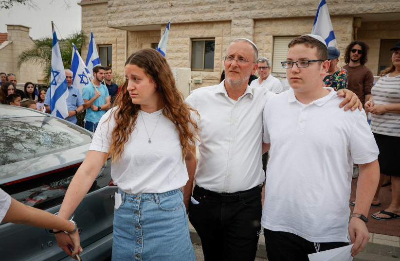  The family of Maia and Rina Dee, seen outside thier home in Efrat, ahead of the two sisters funeral in Efrat on April 09, 2023. (credit: GERSHON ELINSON/FLASH90)