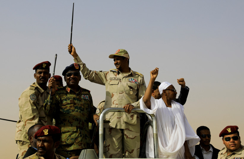  Lieutenant General Mohamed Hamdan Dagalo, deputy head of the military council and head of paramilitary Rapid Support Forces (RSF), greets his supporters as he arrives at a meeting in Aprag village, 60 kilometers away from Khartoum, Sudan, June 22, 2019 (credit: REUTERS/UMIT BEKTAS)