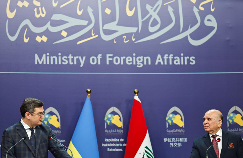 Ukrainian Foreign Minister Dmytro Kuleba and Iraqi Foreign Minister Fuad Hussein hold a joint news conference in Baghdad, Iraq April 17, 2023. (credit: THAIER AL-SUDANI/REUTERS)