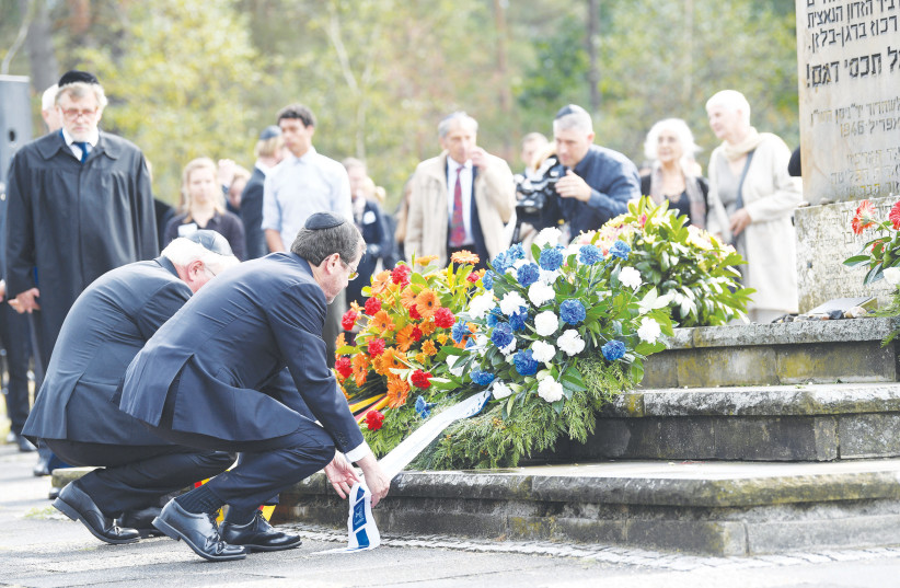  PRESIDENT ISAAC Herzog and German counterpart Frank-Walter Steinmeier lay wreaths at the memorial site of the former concentration camp Bergen-Belsen in Lohheide, Germany, last year. (credit: Fabian Bimmer/REUTERS)