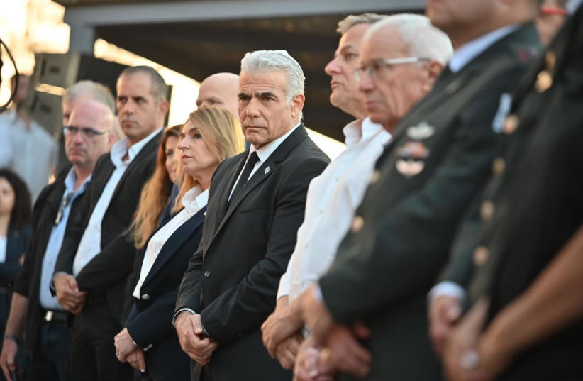 Opposition Leader Yair Lapid at a Holocaust Remembrance Day ceremony in Yad Mordechai, April 17, 2023. (credit: ELAD GUTMAN)