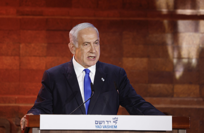  Prime Minister Benjamin Netanyahu speaks at the Holocaust Remembrance Day ceremony at Yad Vashem, April 17, 2023. (credit: MARC ISRAEL SELLEM/THE JERUSALEM POST)
