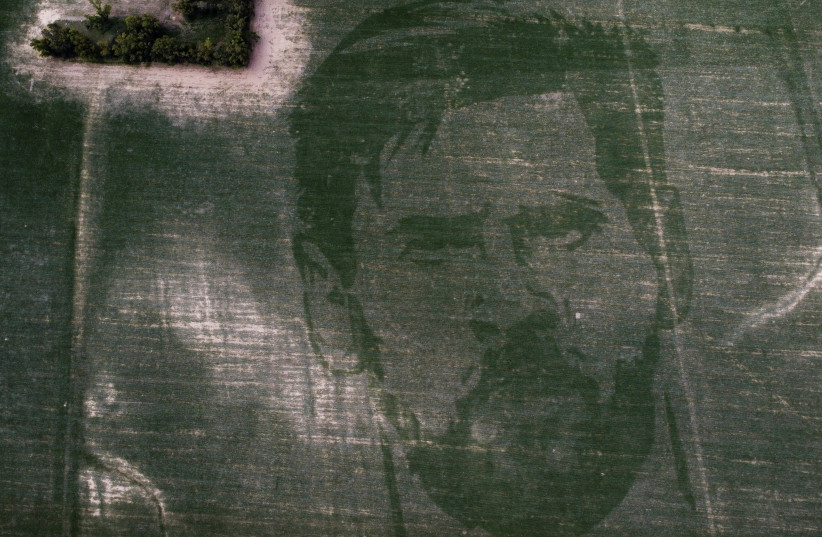  The face of Argentine football star Lionel Messi is depicted in a corn field sown with a special algorithm to plant seeds in a certain pattern to create a huge visual image when the corn plants grow, in Los Condores, on the outskirts of Cordoba, Argentina January 15, 2023.  (credit: AGUSTIN MARCARIAN/REUTERS)