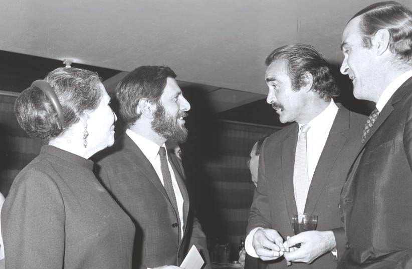  FROM LEFT: Hanna Rovina and Chaim Topol with Sean Connery and Stanley Baker before the inauguration dinner of the Variety Club of Israel in Tel Aviv in 1967. (credit: ILAN BRUNER/GPO)