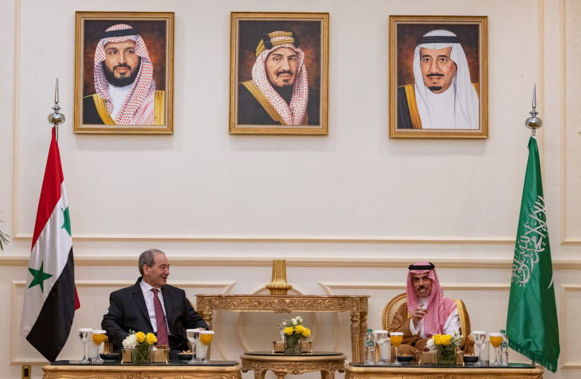  Saudi Foreign Minister Prince Faisal bin Farhan bin Abdullah meets with Syrian Minister of Foreign Affairs and Expatriates Faisal Mekdad in Jeddah, Saudi Arabia, April 12, 2023. (credit: SAUDI PRESS AGENCY/HANDOUT VIA REUTERS)
