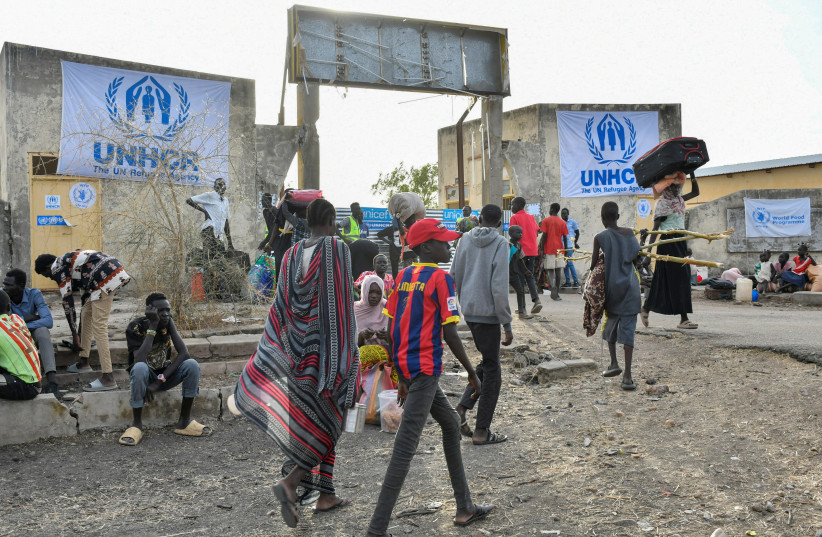 Civilians who fled the war-torn Sudan following the outbreak of fighting between the Sudanese army and the paramilitary Rapid Support Forces (RSF) arrive at the United Nations High Commissioner for Refugees (UNHCR) transit centre in Renk, South Sudan, May 1, 2023. (photo credit: REUTERS/JOK SOLOMUN)