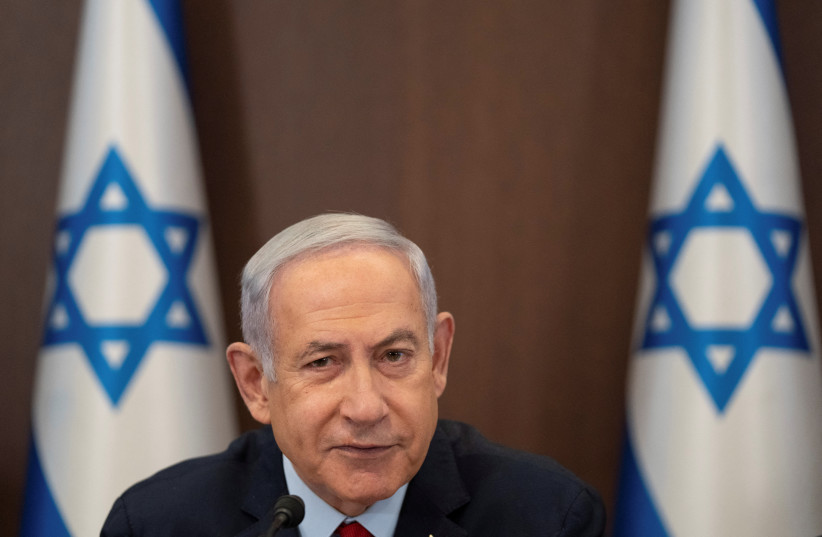  Israeli Prime Minister Benjamin Netanyahu chairs a cabinet meeting at the prime minister's office in Jerusalem, June 18, 2023. (photo credit: Ohad Zwigenberg/Pool via REUTERS)