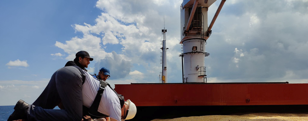 The Joint Coordination Centre officials are seen onboard Sierra Leone-flagged cargo ship Razoni, carrying Ukrainian grain, during an inspection in the Black Sea off Kilyos, near Istanbul, Turkey August 3, 2022.