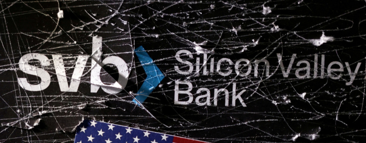  Destroyed SVB (Silicon Valley Bank) logo and U.S. flag is seen in this illustration taken March 13, 2023. 
