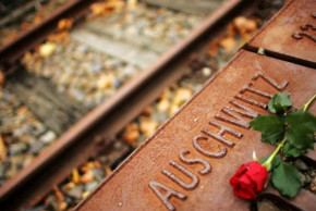 A red rose lies at Gleis 17 (platform 17) holocaust memorial in Berlin