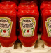 Bottles of Heinz tomato ketchup of U.S. food company Kraft Heinz are offered at a supermarket of Swiss retail group Coop in Zumikon, Switzerland