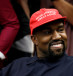 Rapper Kanye West smiles during a meeting with then-US President Donald Trump to discuss criminal justice reform at the White House in Washington, US, October 11, 2018. 