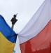  People wave Polish and Ukrainian flags during a demonstration in solidarity with Ukraine in Warsaw, Poland February 20, 2022.