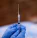  A syringe is filled with a dose of Pfizer's coronavirus disease (COVID-19) vaccine at a pop-up community vaccination center in Valley Stream, New York