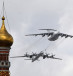  A Russian Tu-95MS strategic bomber and an Ilyushin Il-78 aerial refueling tanker fly over the Kremlin and Red Square in Moscow on May 7, 2021