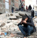  A man reacts at the site of a collapsed building in the aftermath of a deadly earthquake in Diyarbakir, Turkey February 8, 2023.