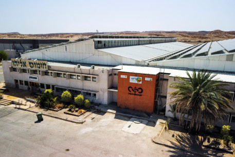 An aerial view shows the logo of Israeli cyber firm NSO Group at one of its branches in the Arava Desert, southern Israel, July 22, 2021.