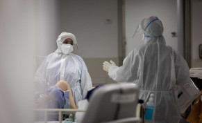  Herzog hospital team members wearing safety gear as they work in the Coronavirus ward of the Herzog Medical Center in Jerusalem, January 13, 2022. 