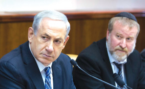  THEN-PRIME MINISTER Benjamin Netanyahu and then-cabinet secretary Avichai Mandelblit sit alongside each other a cabinet meeting in 2014.