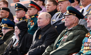  Russian President Vladimir Putin watches a military parade on Victory Day, which marks the 77th anniversary of the victory over Nazi Germany in World War Two, in Red Square in central Moscow, Russia May 9, 2022.