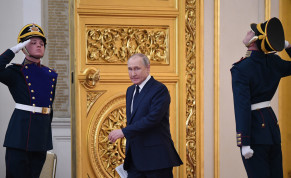 Russian President Vladimir Putin enters a hall in the Kremlin in Moscow on April 26, 2022. 